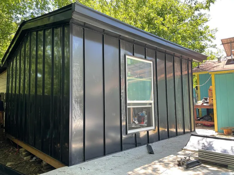 Black standing seam metal wall panels for Roof Inspection in Macon-Bibb County
